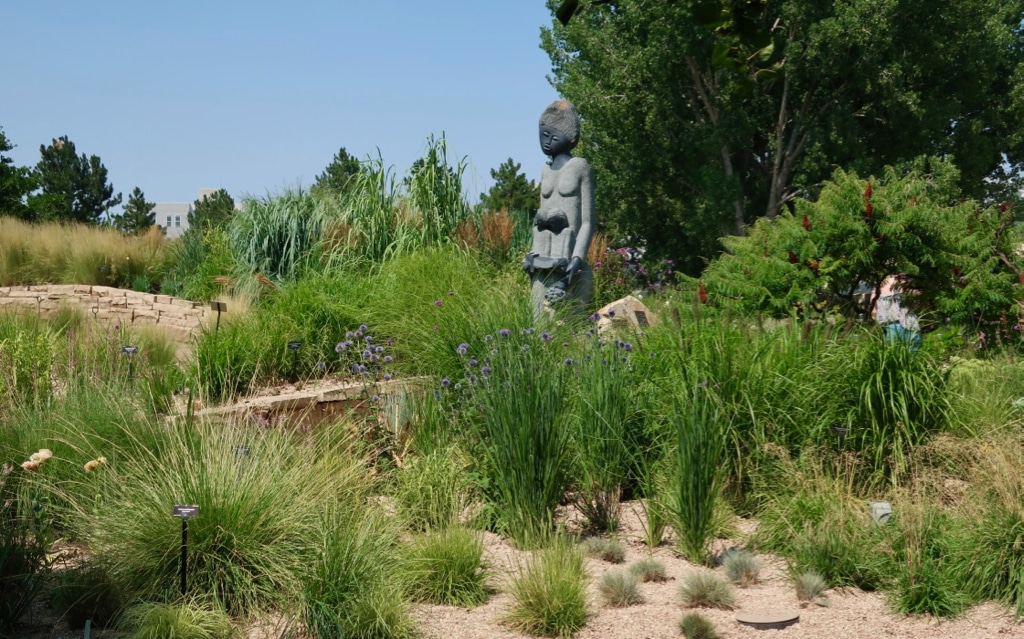 Sculptures among flowers at Denver Botanic Garden
