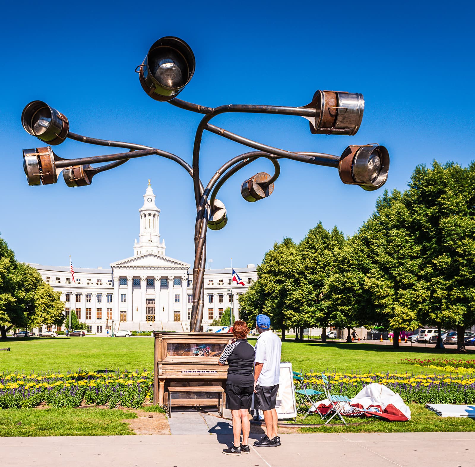 Couple In Downtown Denver admires art.