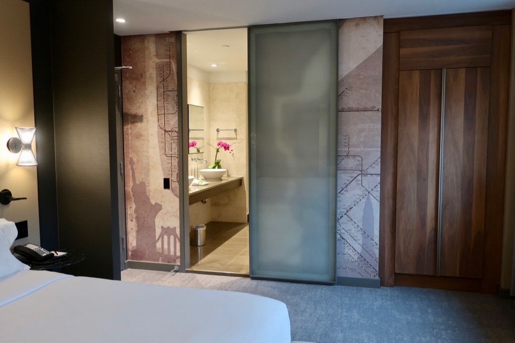 Peek into guest room bathroom at NH Collection Madison Ave