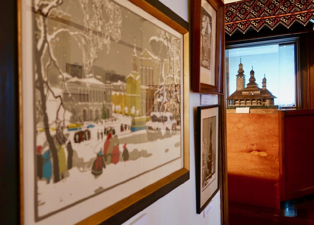 Snowy Kyiv painting with church models in background Ukrainian Museum Stamford CT