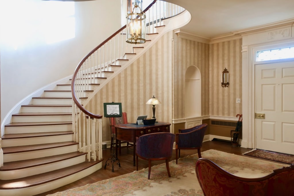 Floating spiral staircase at Great Oak Manor MD