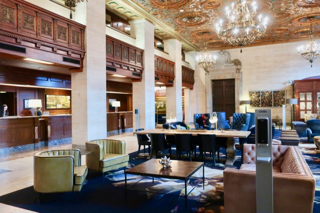 Hotel DuPont Lobby reception with terrazzo floors and hand carved wood ceiling