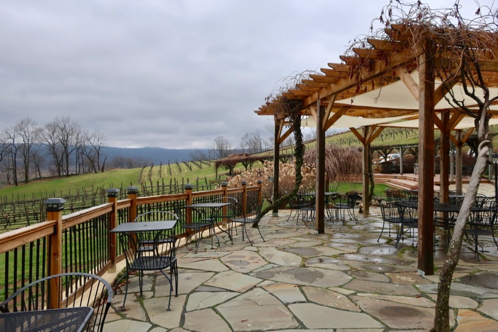 Patio of Hillsboro Vineyards overlooking planted vines