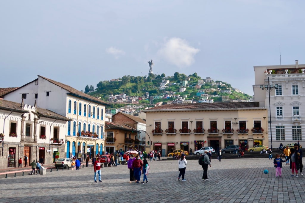 Quito town center with Winged Virgin Mary statue on the hill