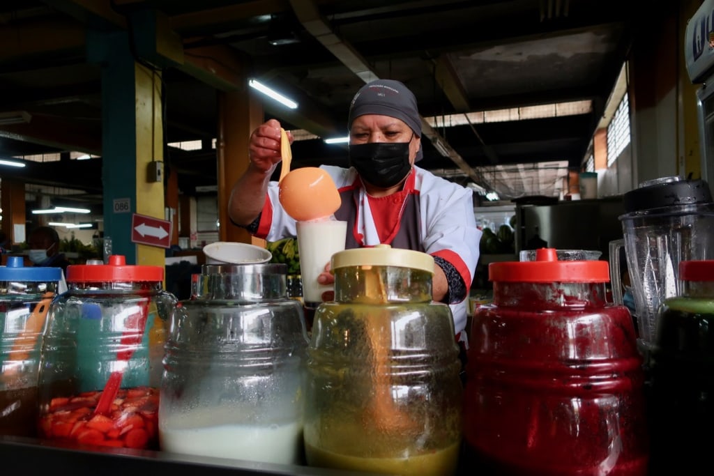 Tropical fruit juice stand in Mercado Santa Clara Quito