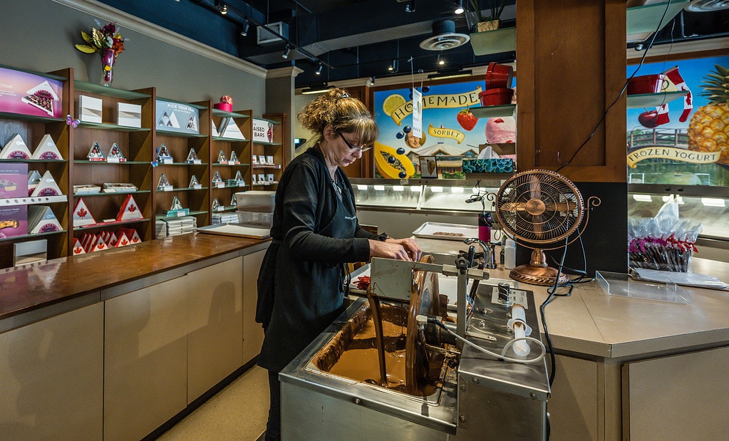 Dipping licorice in chocolate at the Rocky Mountain Chocolate Factory 