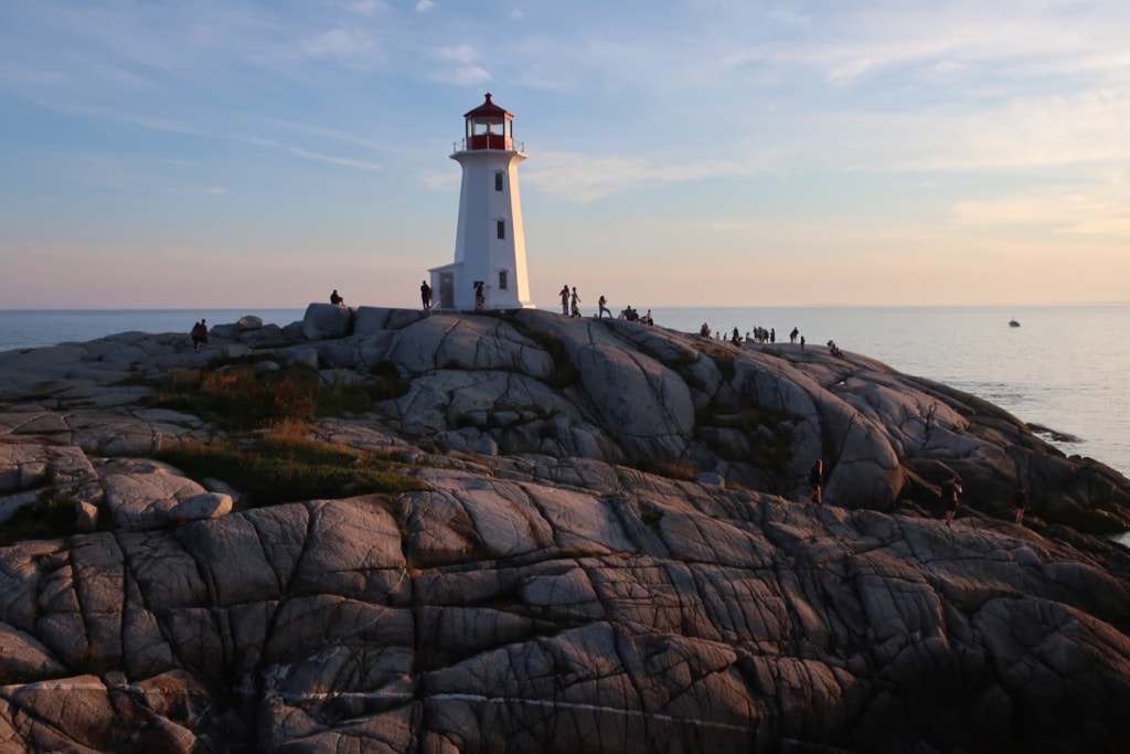 Peggys Cove Lighthouse at sunset on Nova Scotia Road Trip