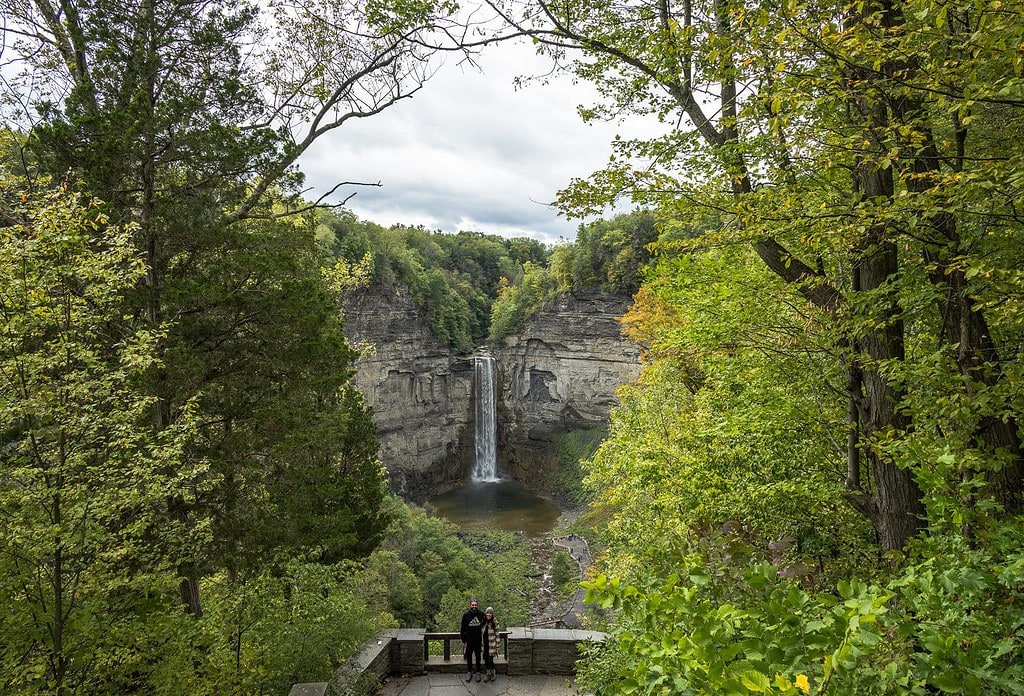 Couple poses for photo at Taughannock Falls Overlook.