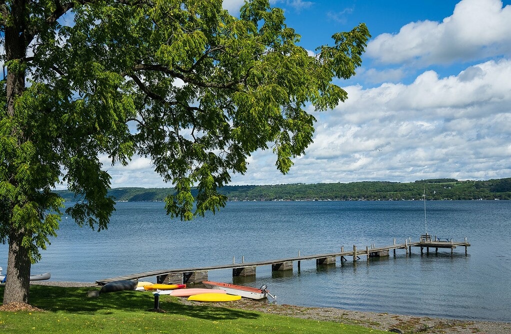 Kayaks on the shore of Cayuga Lake