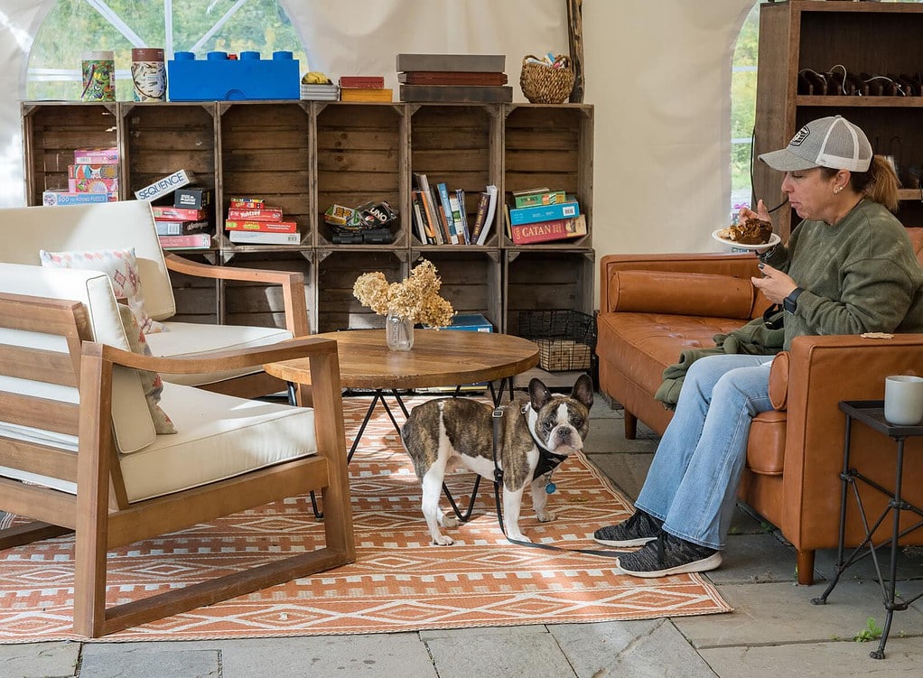 Woman and dog at Firelight Camps Ithaca