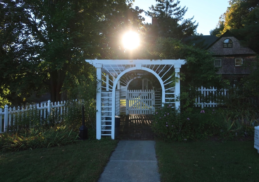 Lodge Building behind pool area at sunset Apple Tree Inn Lenox MA