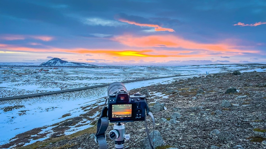 Camera photographing sunset in Iceland