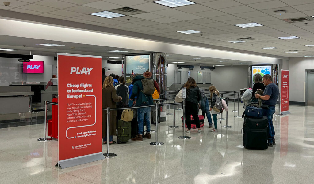People lining up at the Play Airlines counter in Stewart Airport for the NYC to Reykjavik flight.