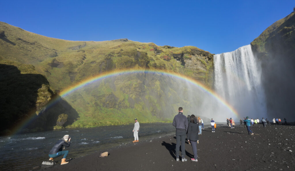 Full rainbow over Skogafoss Waterfall.