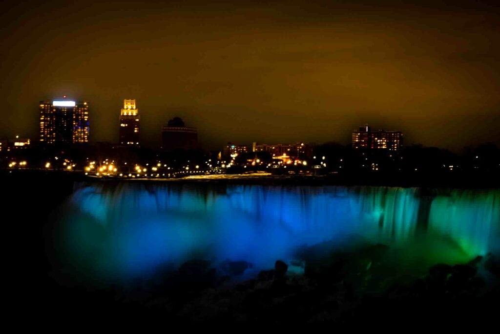 American falls in blue due to Niagara Falls illumination