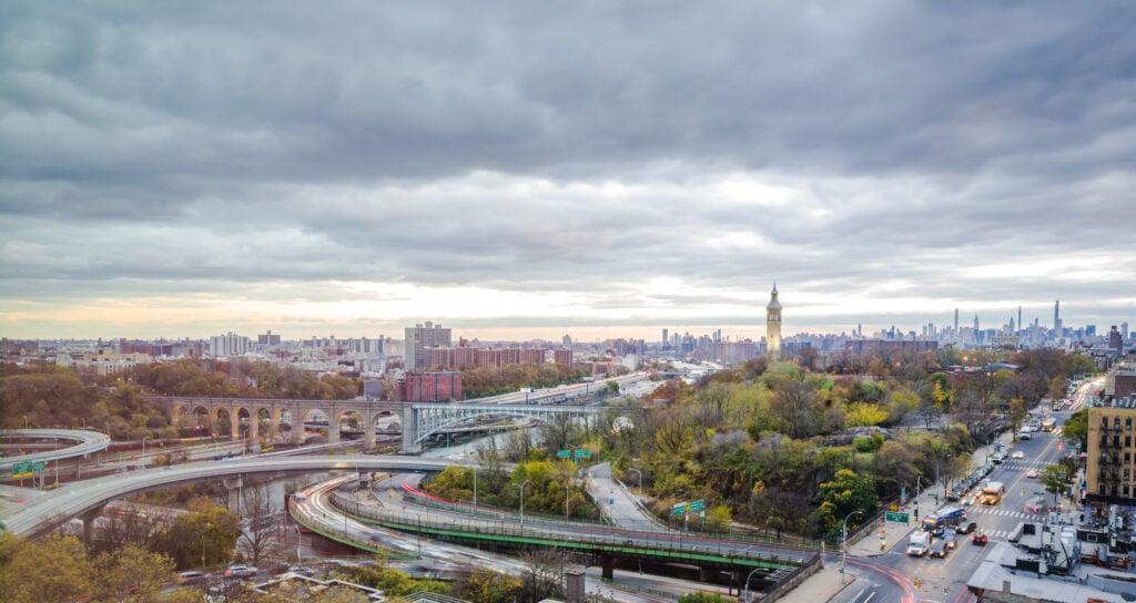 View of Amsterdam Avenue, High Bridge Park, the Harlem River, and NYC's Oldest Bridge from Radio Hotel guest room.