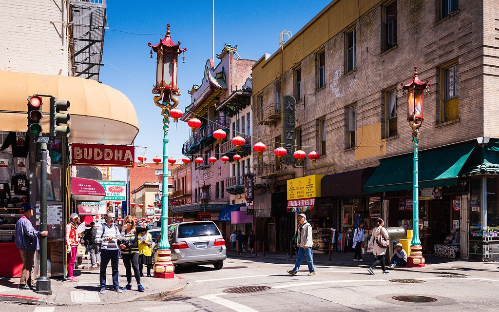 Couple consults map in Chinatown.