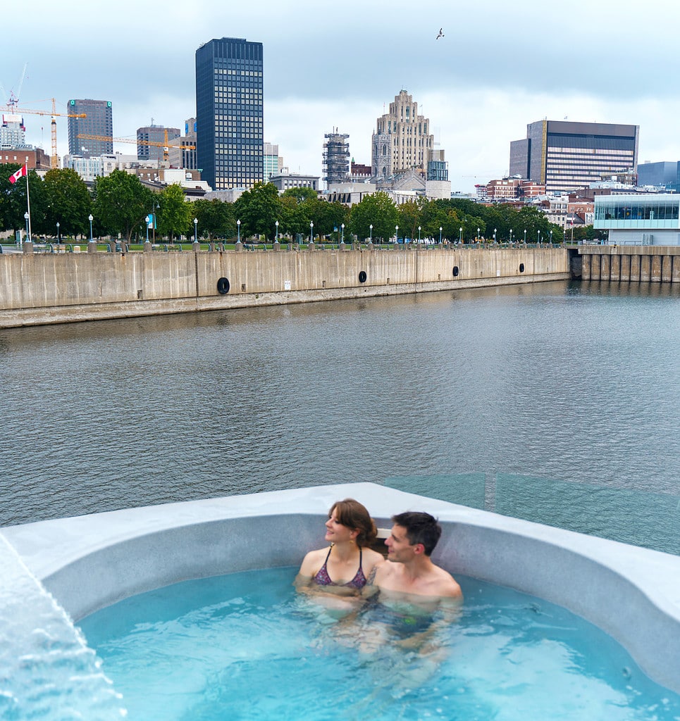 Couple soaks in the hot tub at Bota Bota, the spa-on-the-water