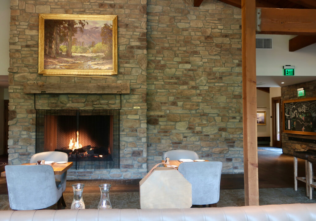 Harvest Restaurant fireplace and Cosby Painting at The Ranch Laguna Beach
