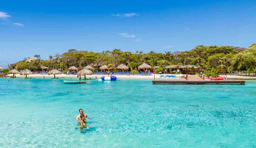 Couple in the ocean at Big French Key in Roatán.