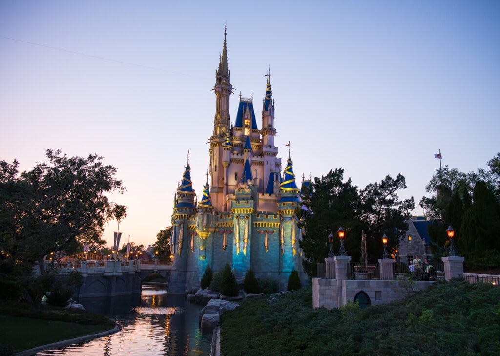 The Wishing Well at twilight in Disney World next to the Magic Castle.