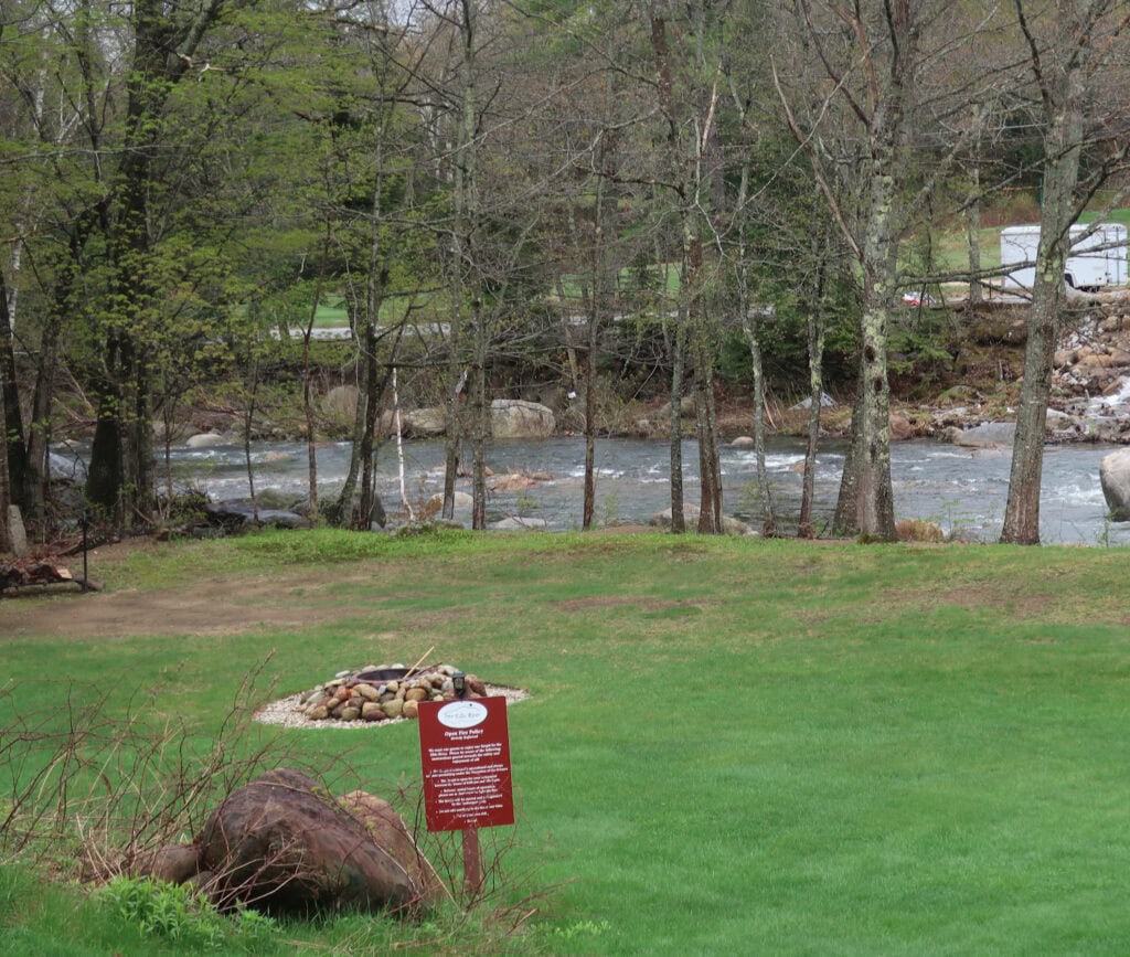Inn at Ellis River riverfront fire pit