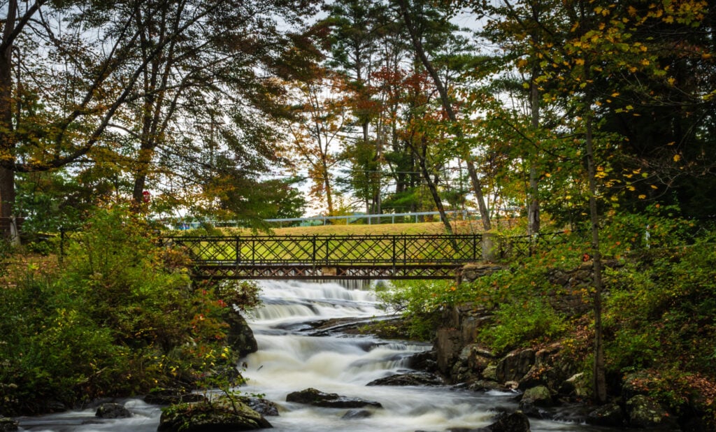 The bridge and waterfall at Mill Park Bridge in Lake Luzerne