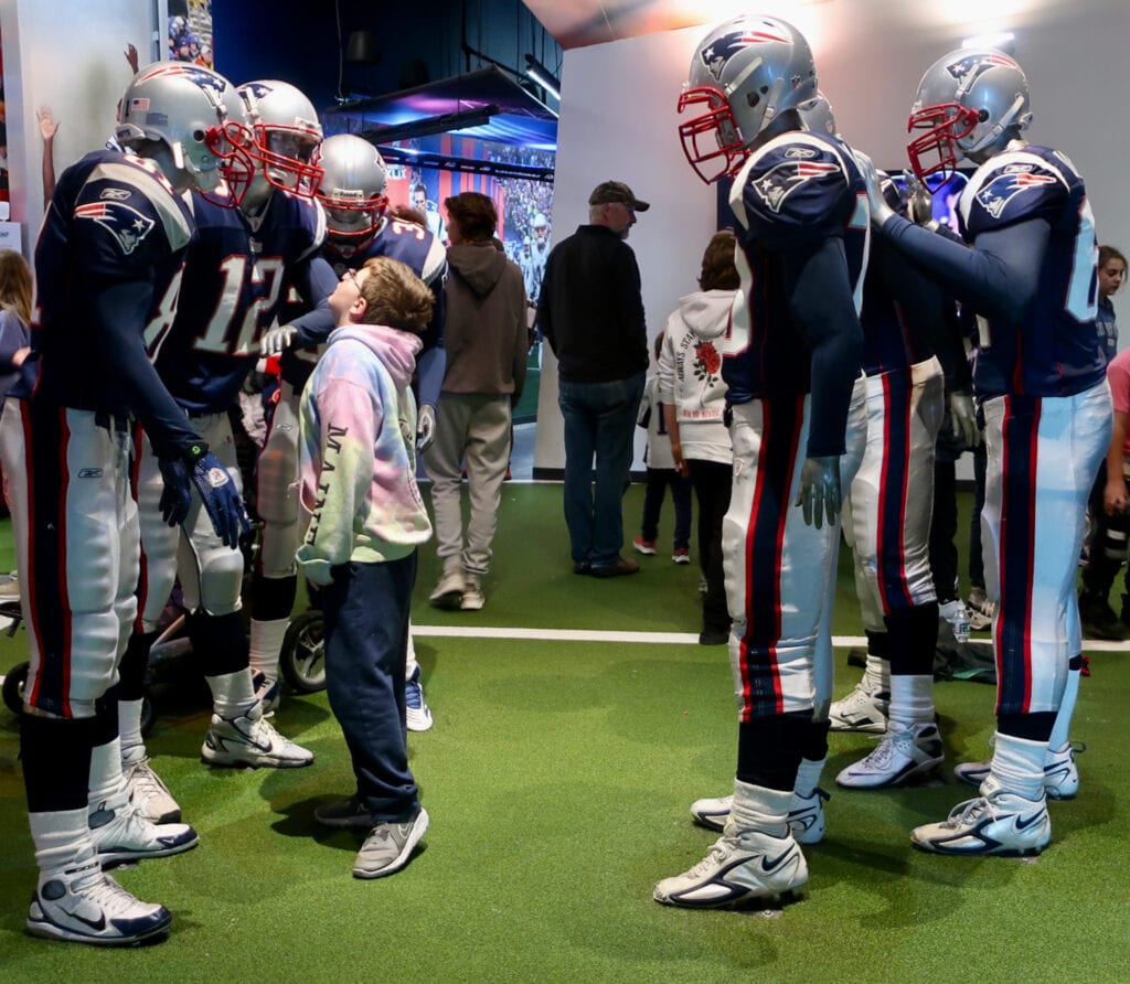 Interactive exhibit - Patriots fan with life-size players at Patriots Hall of Fame Foxboro MA