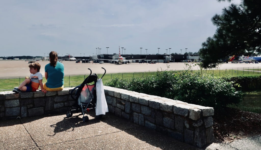 Watching planes take off and landing at Norfolk International Airport from Botanical Gardens