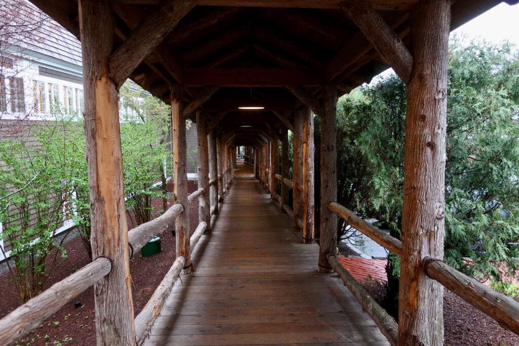 covered walkway connecting buildings at Mill Falls at the Lake in Meredith NH