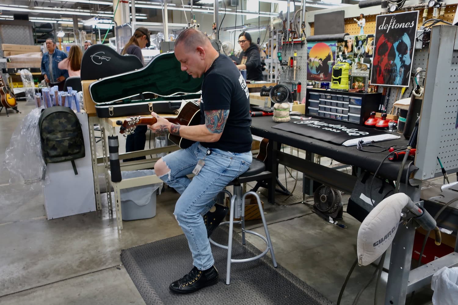 Martin Guitar being played in final step at Martin Guitar Factory PA