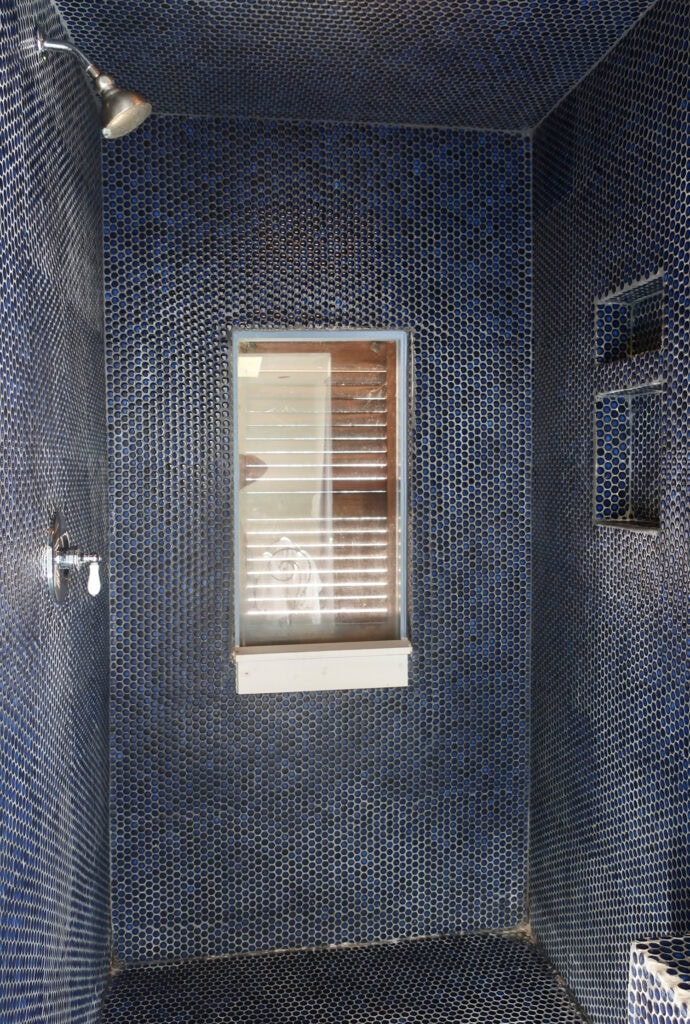 Blue tiled shower in Turley Suite, Inn at Gristmill Square