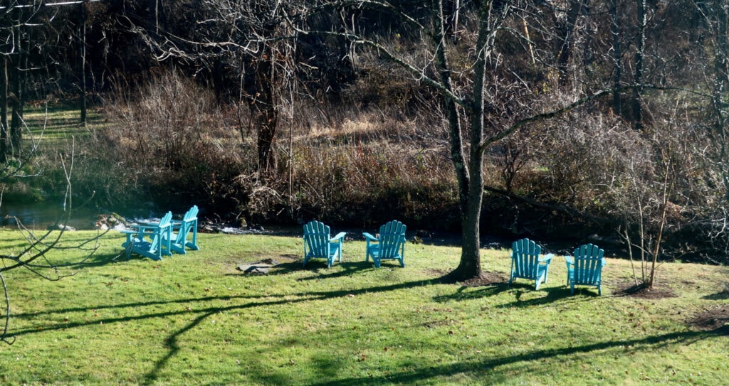 Adirondack Chairs along the river at Inn at Gristmill Square