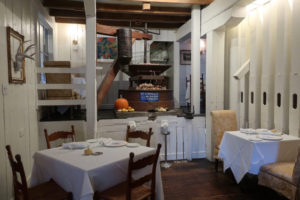 Waterwheel restaurant interior with grinding wheel decor, Warm Springs VA