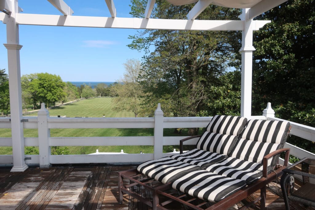 Balcony off of the Rose Room, Inn at Tacaro Estate overlooks grounds and Chesapeake Bay.