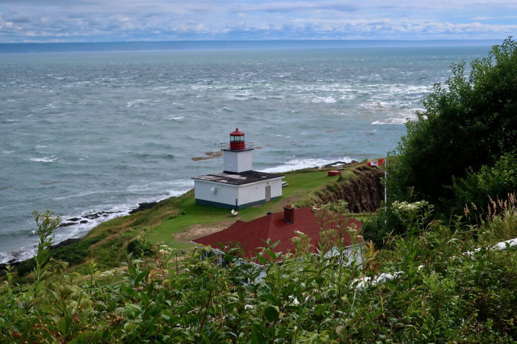Cape Dor Lighthouse and Dory Ripps Nova Scotia Canada