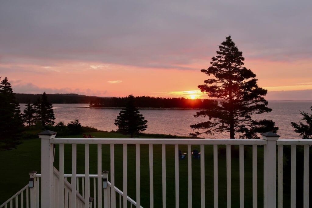 Sunset from room at Seawind Landing Country Inn Charlos Cove Nova Scotia